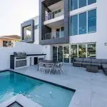 modern townhouses with small courtyard pool outdoor kitchen